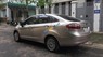 Ford Fiesta MT 2011 - Bán xe cũ Ford Fiesta sản xuất 2011 màu vàng cát, xe số sàn, máy xăng
