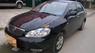 Toyota Corolla 2003 - Bán ô tô Toyota Corolla sản xuất 2003, màu đen số sàn