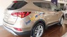 Hyundai Santa Fe 2.4AT 2WD 2017 - Cần bán xe Hyundai Santa Fe 2.4AT 2WD sản xuất 2017, màu vàng
