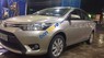 Toyota Vios  E  2015 - Chính chủ bán xe Toyota Vios E 2015, màu vàng cát, sơn zin 100%