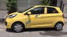 Kia Morning 2015 - Cần bán Kia Morning đời 2015, màu vàng, xe chạy rất tốt, nội thất bên trong còn mới
