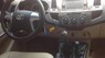 Toyota Hilux 3.0 2014 - Bán ô tô Toyota Hilux 3.0 đời 2014, màu đen, máy dầu, số tay, đi thì cực kỳ tiết kiệm nhiên liệu