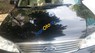 Ford Laser Ghia 2004 - Bán Ford Laser Ghia đời 2004, màu đen, máy êm điều hòa mát sâu, gầm bệ chắc chắn
