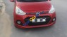 Hyundai Grand i10   1.2 AT  2016 - Cần bán lại xe Hyundai Grand i10 1.2 AT đời 2016, màu đỏ, chạy được 1 vạn km