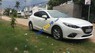 Mazda 3  AT 2015 - Cần bán lại xe Mazda 3 AT sản xuất năm 2015, màu trắng, 600 triệu