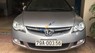 Honda Civic MT1.8 2006 - Cần bán Honda Civic MT1.8 đời 2006, màu bạc, máy rất êm, sơn rin còn 80%