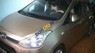 Hyundai i10 MT 2014 - Bán xe cũ Hyundai i10 2014, màu vàng, sử dụng số sàn, máy xăng, đã đi 30000 km