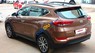 Hyundai Tucson 2.0AT 2015 - Bán Hyundai Tucson 2.0AT 2015, màu nâu, nguyên bản, máy móc êm ái