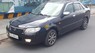 Mazda 323 Classic 2002 - Cần bán gấp Mazda 323 Classic sản xuất năm 2002, màu đen