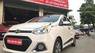 Hyundai Grand i10  1.2AT 2015 - Bán Hyundai Grand i10 1.2AT sản xuất 2015, màu trắng, xe đẹp