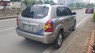 Hyundai Tucson  2.0  AT  2009 - Bán Hyundai Tucson 2.0  AT năm sản xuất 2009, màu vàng, xe nhập