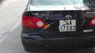Toyota Corolla J 2003 - Cần bán gấp Toyota Corolla J sản xuất 2003, màu đen 