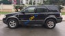 Ford Escape   XLT AT  2005 - Cần bán Ford Escape XLT AT sản xuất 2005, màu đen, xe nhập