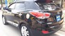Hyundai Tucson 4WD 2009 - Cần bán lại xe Hyundai Tucson 4WD năm 2009, màu đen, xe nhập số tự động, 585 triệu