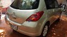 Nissan Tiida MT 2007 - Bán Nissan Tiida MT đời 2007, màu vàng, xe đã đi 11 vạn km