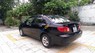Toyota Corolla altis 1.3MT 2002 - Cần bán gấp Toyota Corolla altis 1.3MT năm sản xuất 2002, màu đen