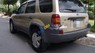 Ford Escape 3.0 V6 2003 - Bán Ford Escape 3.0 V6 sản xuất 2003, màu vàng số tự động