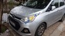 Hyundai Grand i10 MT 2014 - Cần bán lại xe Hyundai Grand i10 MT sản xuất 2014, màu bạc, máy nguyên bản 100%