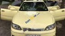 Lexus ES 300 1992 - Cần bán xe Lexus ES 300 sản xuất năm 1992, màu vàng, nhập khẩu số tự động