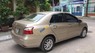 Toyota Vios 1.5 E 2012 - Cần bán lại xe Toyota Vios 1.5 E năm 2012, màu vàng xe gia đình, giá tốt