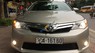 Toyota Camry XLE 2014 - Cần bán gấp Toyota Camry XLE sản xuất năm 2014, màu vàng, nhập khẩu nguyên chiếc