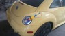 Volkswagen Beetle   2004 - Bán Volkswagen Beetle sản xuất 2004, màu vàng, xe nhập