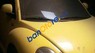 Volkswagen Beetle   2004 - Bán Volkswagen Beetle sản xuất 2004, màu vàng, xe nhập