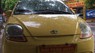 Daewoo Matiz 2009 - Cần bán xe Daewoo Matiz sản xuất 2009, màu vàng, xe nhập