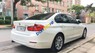 BMW 3 Series  320i  2013 - Cần bán lại xe BMW 3 Series 320i năm sản xuất 2013, màu trắng