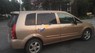 Mazda Premacy 2003 - Cần bán xe Mazda Premacy năm sản xuất 2003, màu vàng 