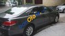 Toyota Camry AT 2009 - Bán xe cũ Toyota Camry 2.0 E, full option SX 2009, ĐK 2010 màu ghi còn rất mới