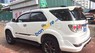 Toyota Fortuner TRD sportivo 4x2 2014 - Cần bán gấp Toyota Fortuner TRD Sportivo 4x2 đời 2014, màu trắng, xe không bị tai nạn, không ngập nước