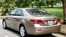 Toyota Camry 2007 - Em cần bán Toyota Camry 2.4G màu nâu vàng, SX và ĐK 2007, ODO đúng 58.906 (bảo dưỡng hãng định kỳ), xe đã được gắn thêm