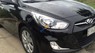 Hyundai Accent 1.4 MT 2012 - Bán Hyundai Accent đời 2012, màu đen, máy móc, gầm, máy lạnh còn mới