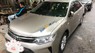 Toyota Camry 2.0E 2016 - Chính chủ cần bán gấp Toyota Camry 2.0E đời 2016, màu vàng