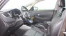 Kia Rondo GAT 2016 - Cần bán xe Kia Rondo GAT sản xuất năm 2016, màu nâu