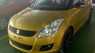 Suzuki Swift 2017 - Cần bán Suzuki Swift năm sản xuất 2017, màu vàng, 569tr