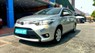 Toyota Vios E 2014 - Cần bán gấp Toyota Vios E năm 2014, màu bạc số sàn