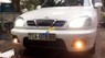 Daewoo Lanos 2002 - Cần bán xe Daewoo Lanos sản xuất năm 2002, màu trắng, nhập khẩu nguyên chiếc