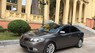 Kia Cerato 1.6 AT 2011 - Cần bán Kia Cerato 1.6 AT năm sản xuất 2011, màu xám, xe nhập số tự động