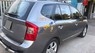 Kia Carens 2.0 AT 2009 - Em cần bán xe Kia Carens 2009 2.0, tự động, màu nâu xám bản full option