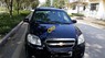 Chevrolet Aveo 2011 - Cần bán gấp Chevrolet Aveo sản xuất 2011, màu đen, 110tr