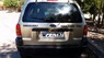 Ford Escape XLT 2002 - Cần bán lại xe Ford Escape XLT đời 2002, màu vàng xe gia đình, giá 150tr