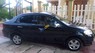 Chevrolet Aveo 1.5 MT 2011 - Cần bán lại xe Chevrolet Aveo 1.5 MT 2011, màu đen còn mới