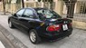 Mazda 323 GLXi 1999 - Bán Mazda 323 GLXi 1999, màu đen, 130tr