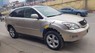 Lexus RX 330 AWD 2005 - Bán ô tô Lexus RX 330 AWD đời 2005, màu vàng, nhập khẩu nguyên chiếc chính chủ, giá chỉ 725 triệu