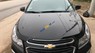 Chevrolet Cruze LT 1.6 MT 2016 - Bán ô tô Chevrolet Cruze LT đời 2016, màu đen như mới