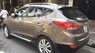 Hyundai Tucson 2011 - Cần bán xe Hyundai Tucson đời 2011, màu nâu, xe nhập còn mới