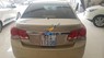 Chevrolet Cruze MT 2011 - Bán Chevrolet Cruze MT đời 2011, màu vàng cát