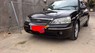 Ford Laser Ghia 1.8 AT 2005 - Cần bán gấp Ford Laser Ghia 1.8 AT đời 2005, màu đen chính chủ